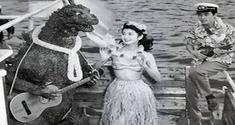 Godzilla playing guitar