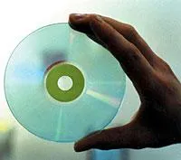 Hand Holding Clear Disc
