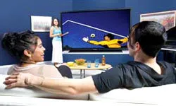 Couple Watching Panasonic HDTV/Blu-ray Player